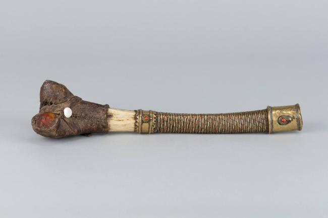 Leg Bone Trumpet (kangling); Tibet; 18th-19th century; human bone, copper, coral, leather; Rubi…