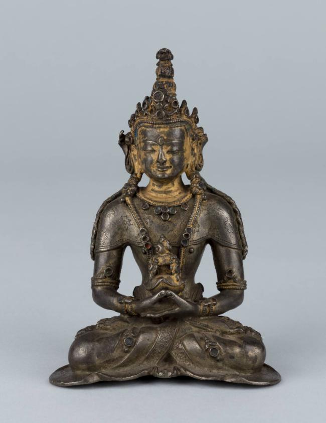 Buddha Amitayus; Tibet; 17th century; silver alloy with inlaid semi-precious stones; Rubin Muse…